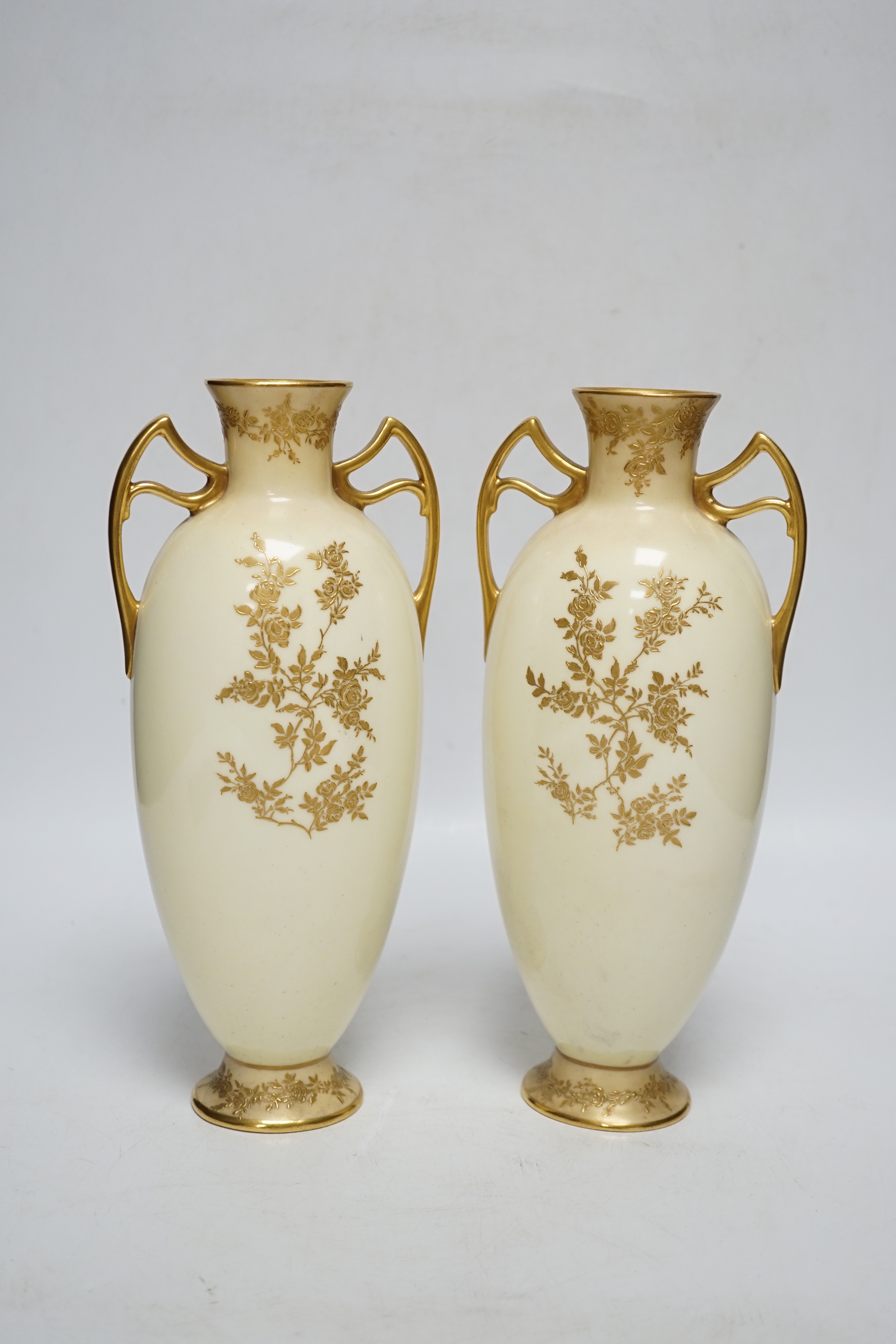 A pair of Royal Doulton vases painted with female portraits, by Henri Boullemier, 25.5cm